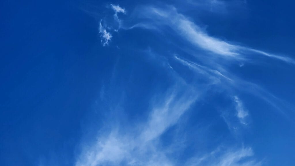 Wispy clouds in a blue sky